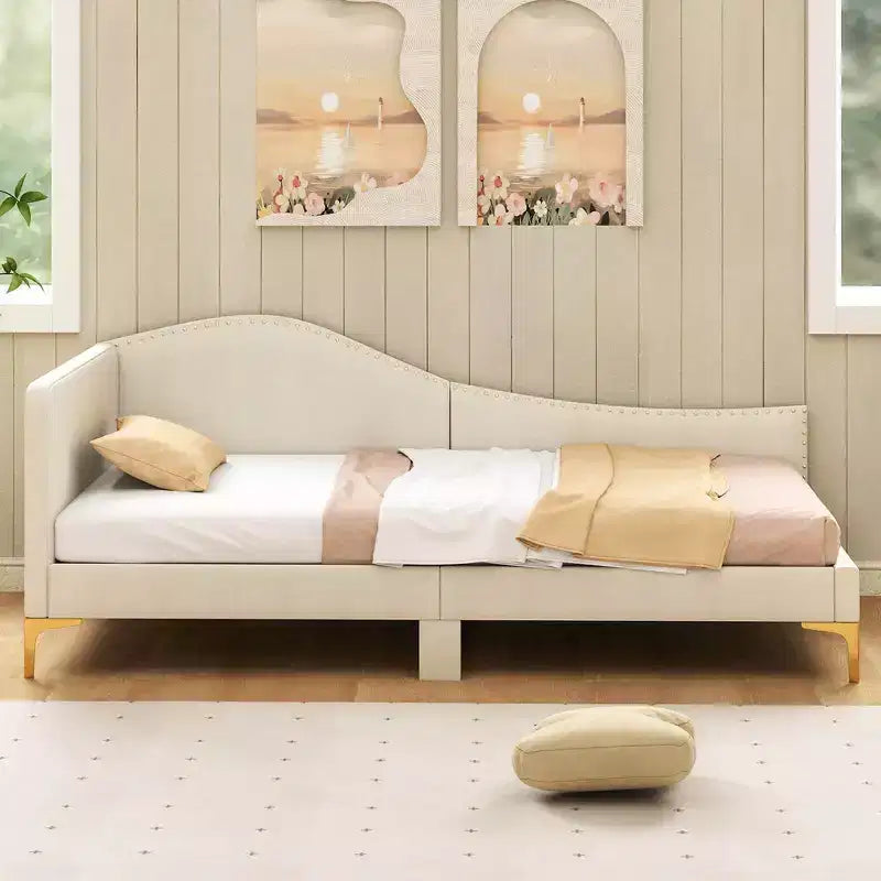 Divano letto imbottito trapuntato color beige con rivetti e gambe in metallo, singolo/una piazza e mezza, 1 persona